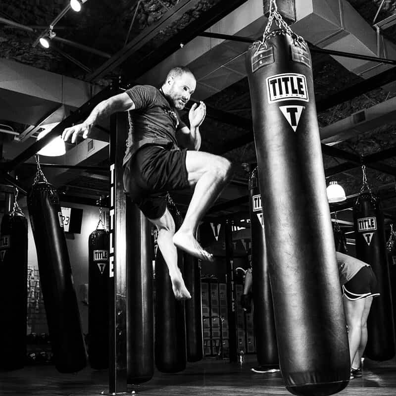 Mixed Martial Arts Lessons for Adults in Roy UT - Flying Knee Black and White MMA